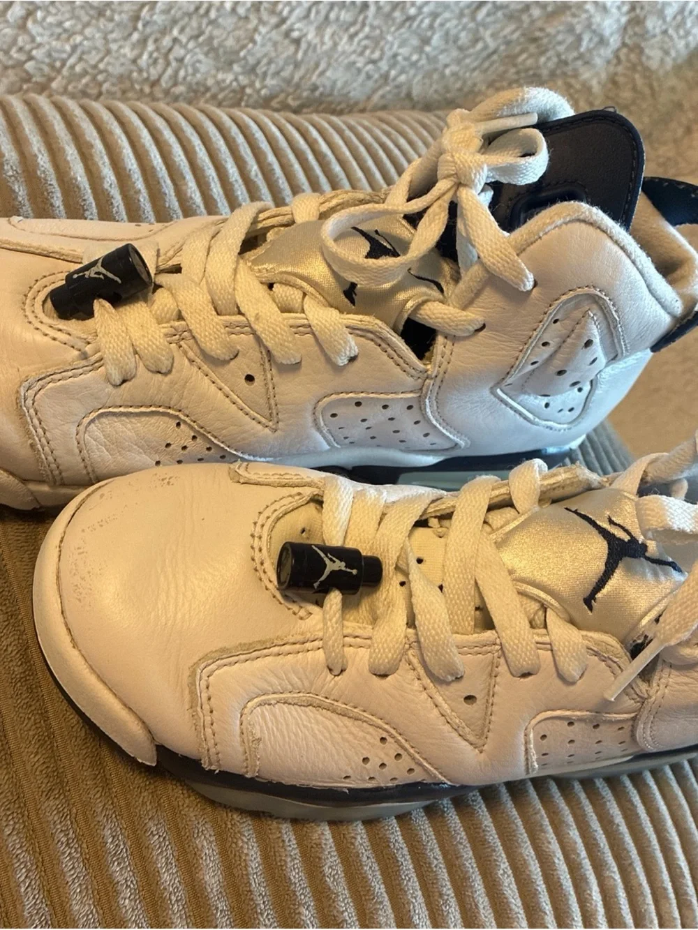 Jordan White and Navy High-Top Basketball Sneakers
